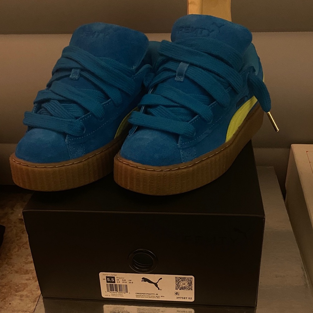 Puma Suede Sneakers in Blue with Yellow Stripe